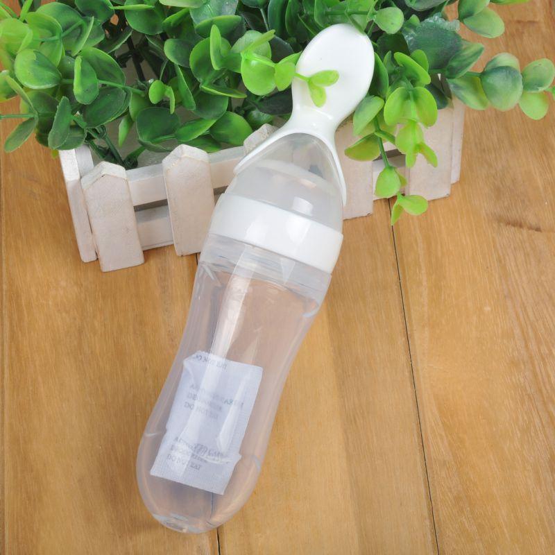 BABY SQUEEZING FEEDING BOTTLE WITH SPOON FEEDER - oyocrate