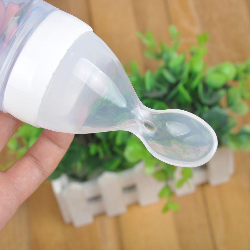 BABY SQUEEZING FEEDING BOTTLE WITH SPOON FEEDER - oyocrate