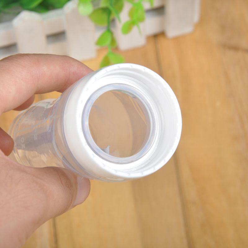 BABY SQUEEZING FEEDING BOTTLE WITH SPOON FEEDER - oyocrate